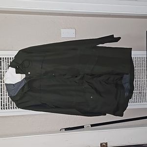 Used once, size XL, olive green rain coat